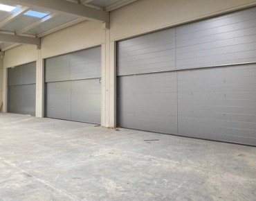 Puertas contrapesadas verticales plegables